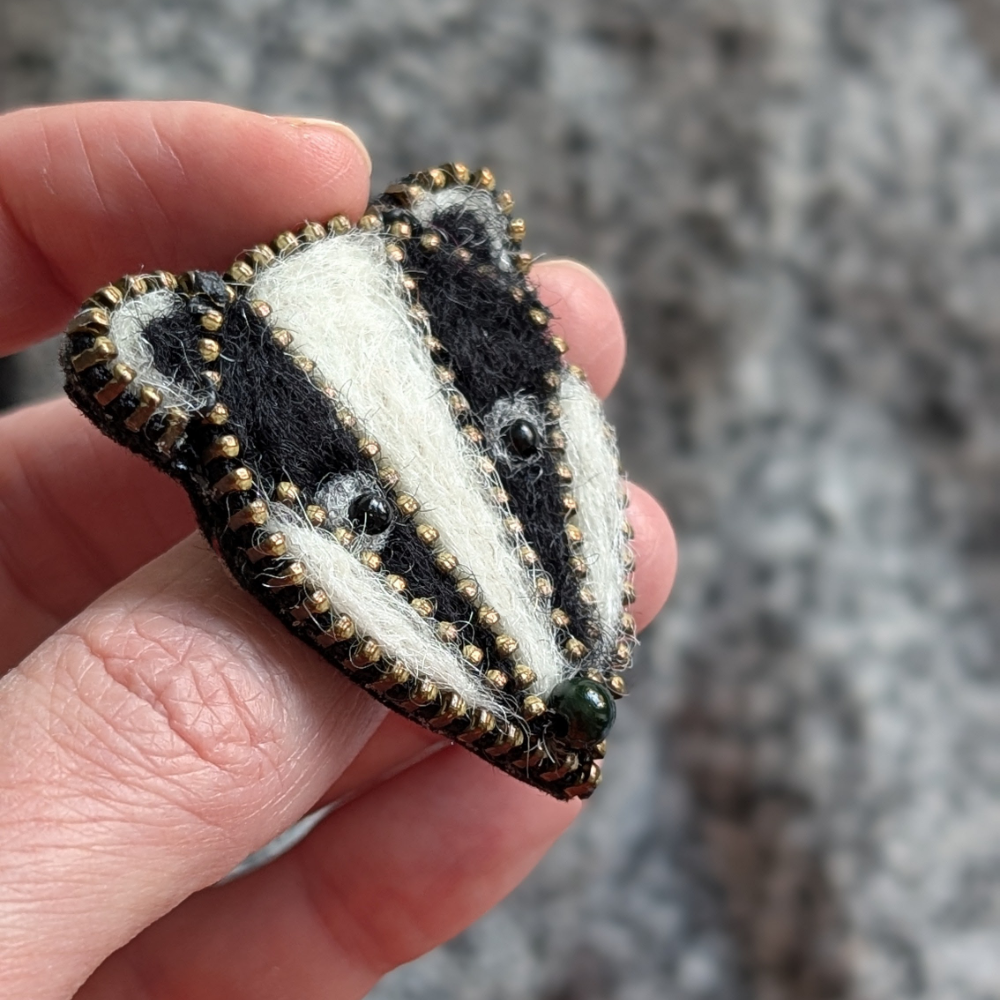 Badger brooch side view