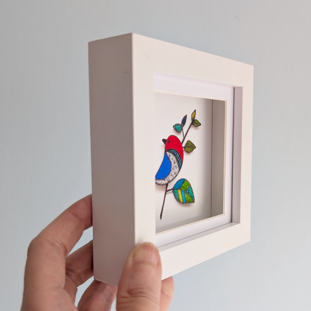 Preening Bird white frame side
